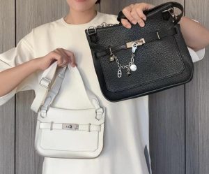 Comparison of Hermes Jypsiere 28 bag (black) and a mini version (white)