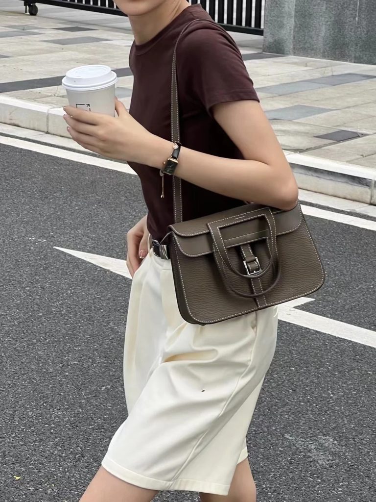 Hermès Halzan 25 bag worn as a shoulder bag