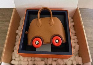 Bolide On Wheels, a unique version of the Hermès Bolide bag featuring wheels