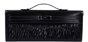 The Kelly Cut in black leather with feather detailing, featuring an all-black So Black hardware design. 