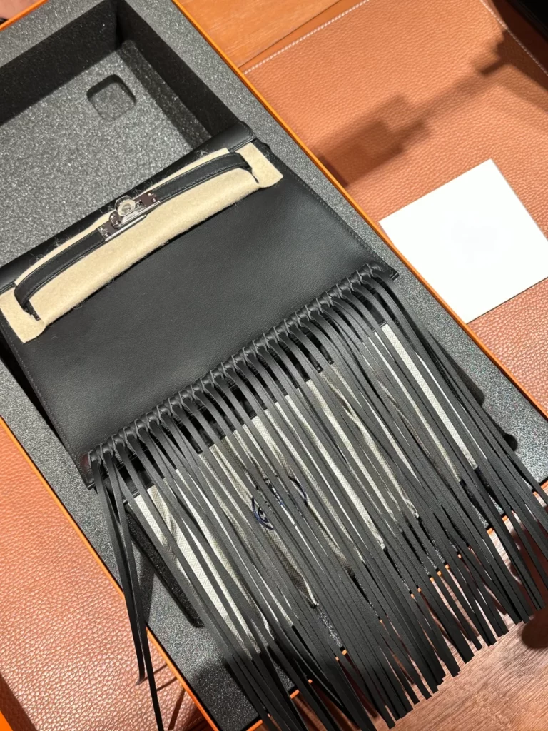 Black Hermès Kelly Danse Anate bag with leather fringe detail