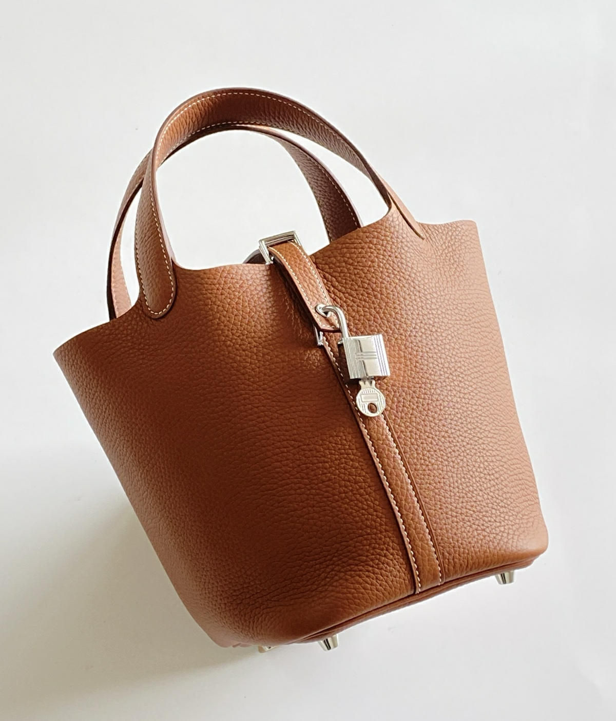 Angled front view of Hermes Picotin 18 bag in Gold leather with Palladium hardware